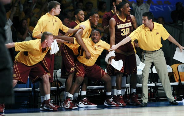 The Gophers reacted in the final seconds of their victory over Stanford in the Battle 4 Atlantis basketball tournament in November 2012 in the Bahamas