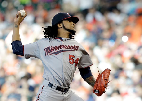 Minnesota Twins' Ervin Santana delivers a pitch against the Houston Astros in the first inning of a baseball game Saturday, Sept. 5, 2015, in Houston.