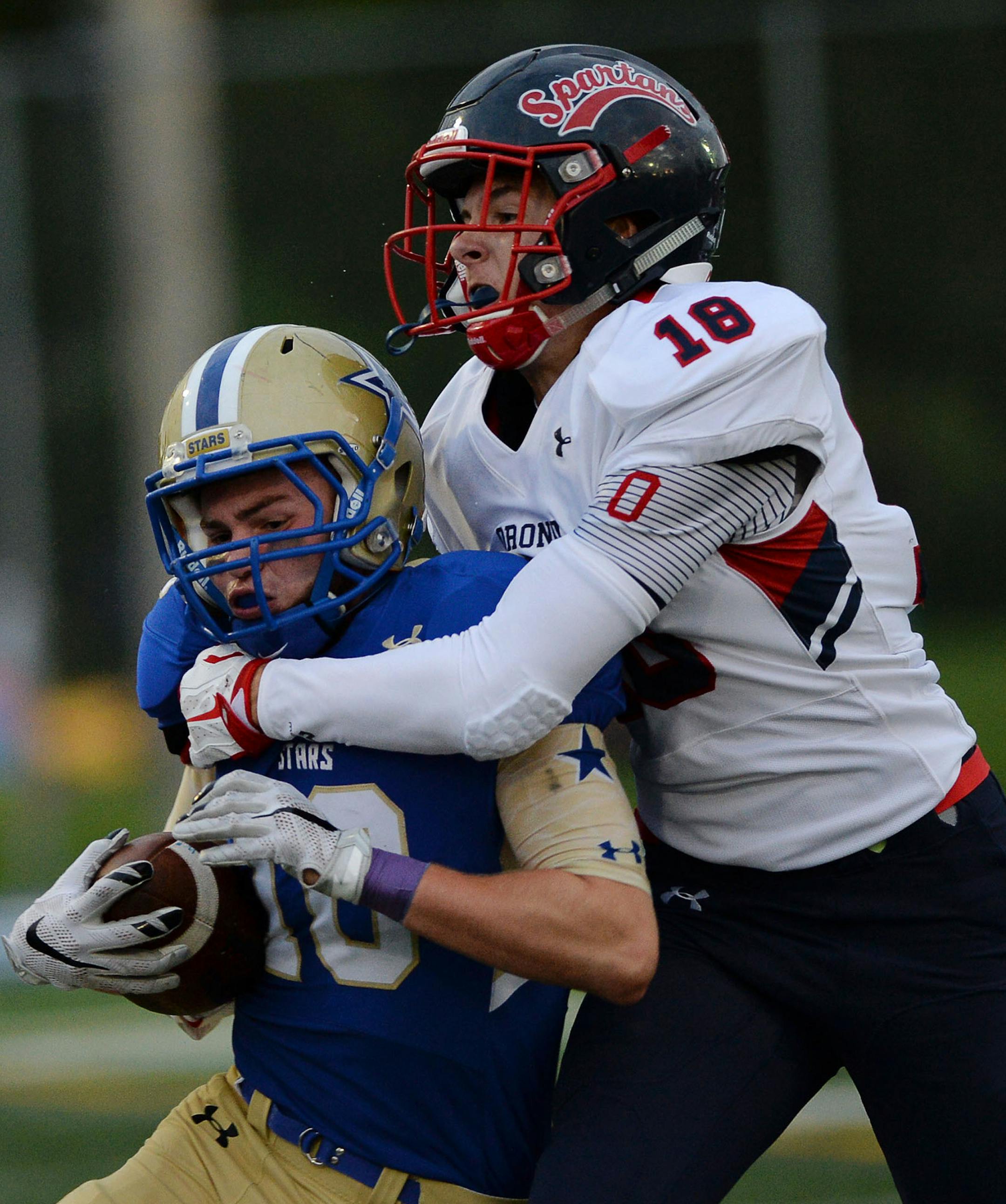 ___ during the __ quarter at the Orono vs Holy Angels football game at Holy Angels Academy in Richfield, Minn. on Friday September 11, 2015. ] RACHEL WOOLF ___ defeated ___ ___.