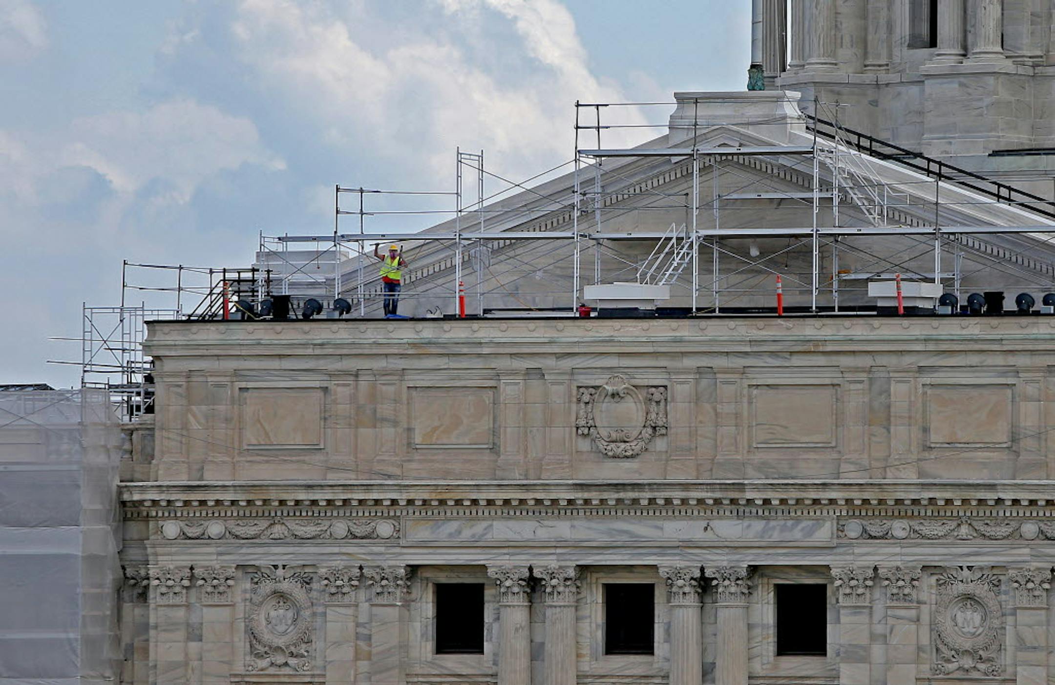 Workers worked on the renovation of the northeast side of the Capitol on Monday.