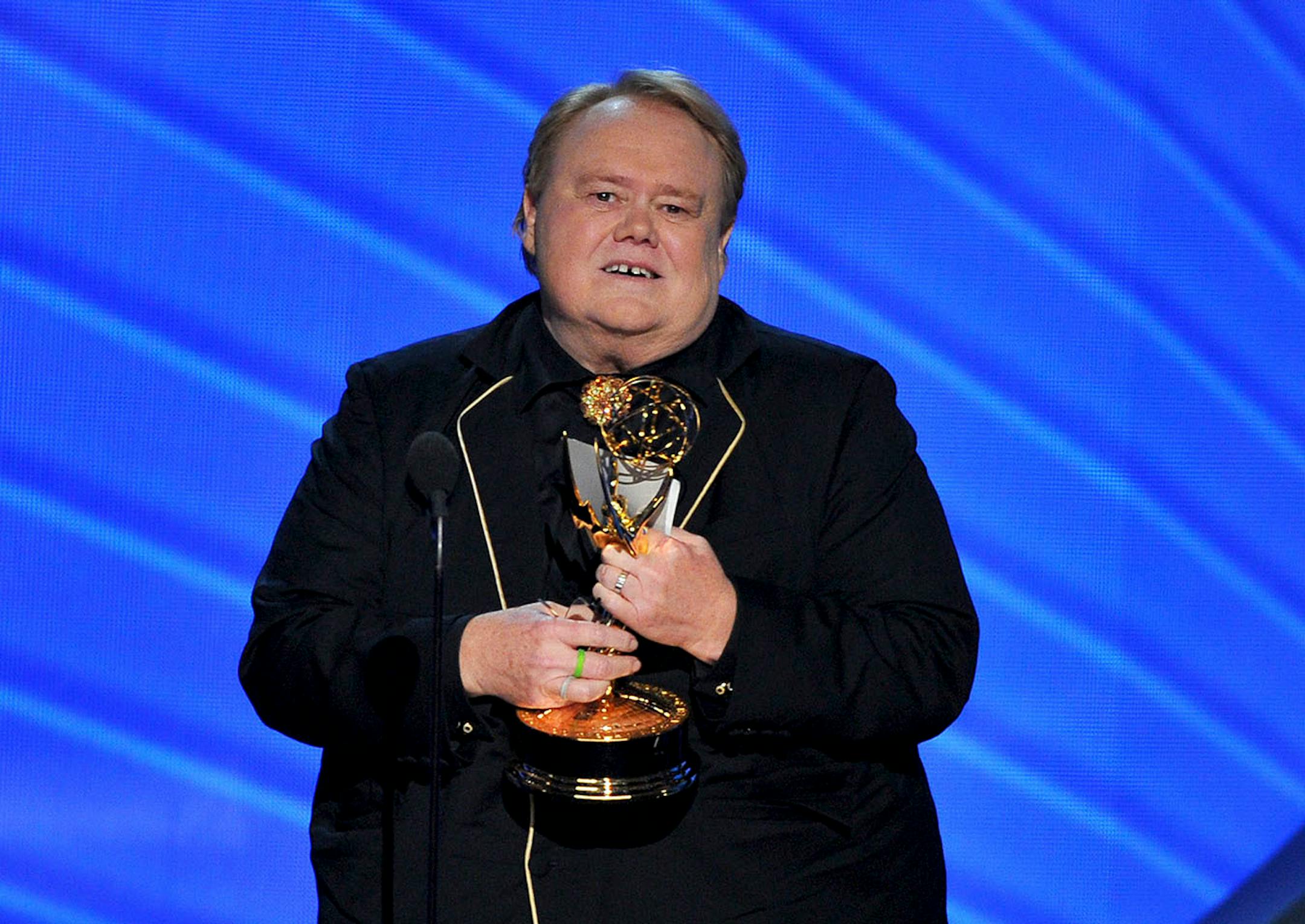 Louis Anderson accepts the award for outstanding supporting actor in a comedy series for ìBasketsî at the 68th Primetime Emmy Awards on Sunday, Sept. 18, 2016, at the Microsoft Theater in Los Angeles. (Photo by Vince Bucci/Invision for the Television Academy/AP Images) ORG XMIT: INVL