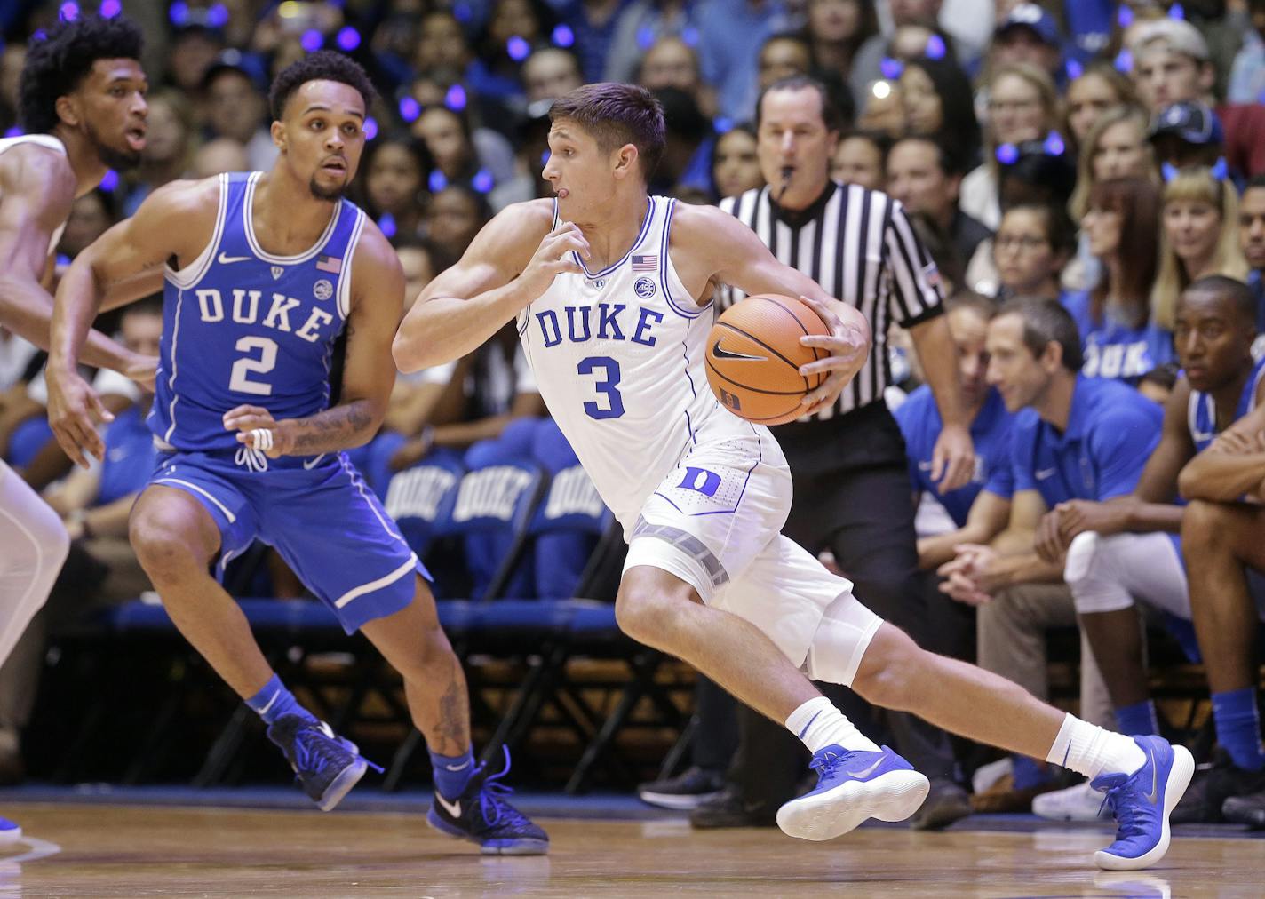 Duke's Grayson Allen (3) dribbles while Gary Trent Jr. (2) defends during the Blue-White scrimmage in the NCAA college basketball team's Countdown to Craziness event to kick off the season in Durham, N.C., Friday, Oct. 20, 2017. (AP Photo/Gerry Broome)