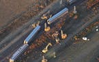 This aerial view taken Sunday, Sept. 26, 2021, shows part of an Amtrak train that derailed in north-central Montana Saturday that killed multiple peop