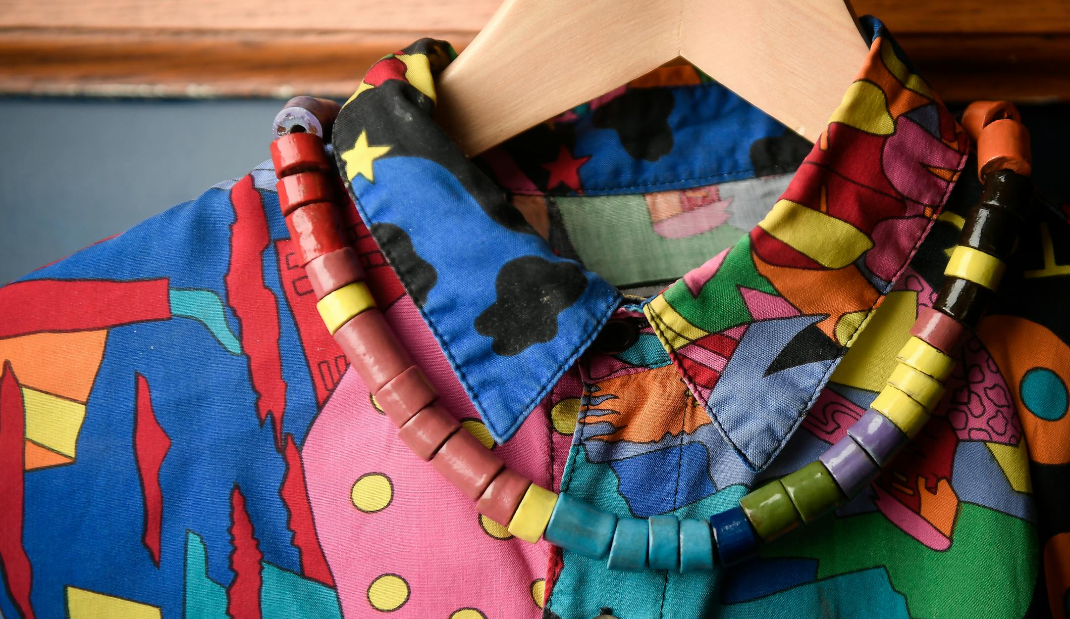 A necklace made by Erin Smith was made to match a colorful shirt in her collection.