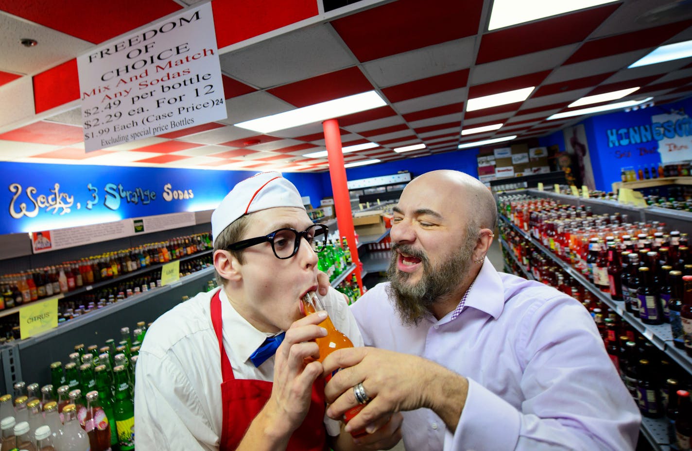 Blue Sun Soda Shop owner Mark Lazarchic goofed around with Neal Skoy, left, who sometimes dresses as an old fashined soda jerk.