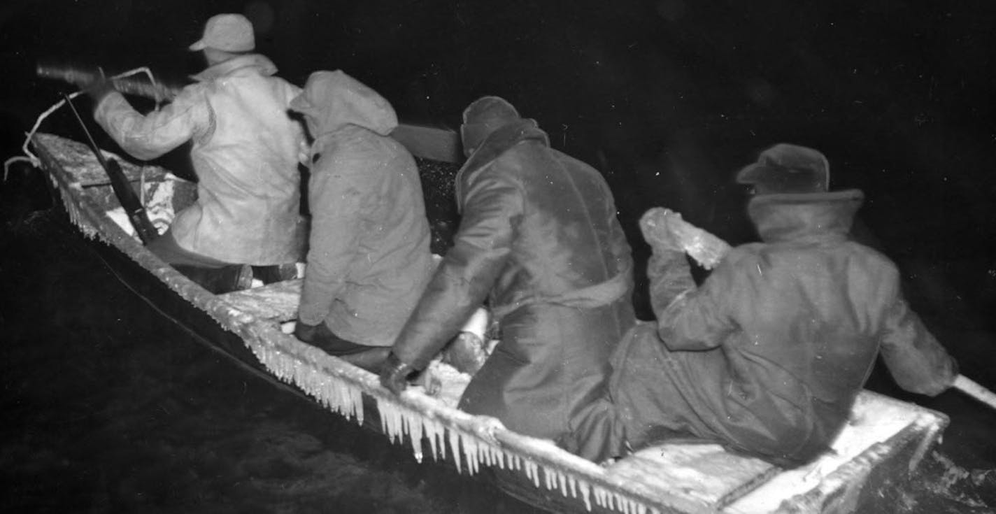 Searchers in a hunting skiff combed the shores of the Mississippi River bottomlands, looking for hunters caught in the blizzard.