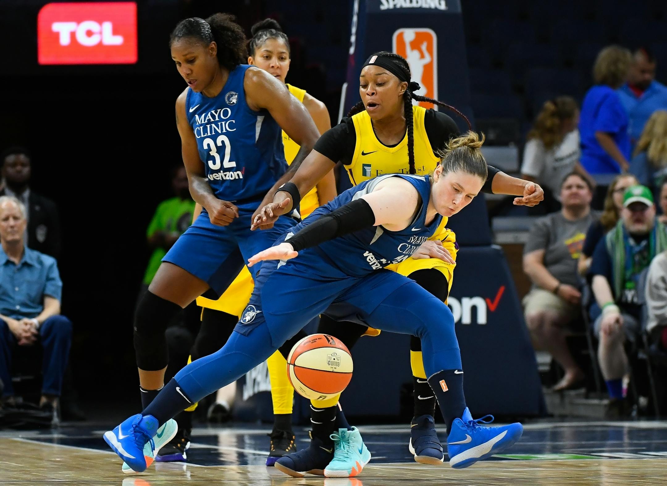 Los Angeles Sparks guard Odyssey Sims (1) knocked the ball loose from Minnesota Lynx guard Lindsay Whalen (13) in the second quarter Thursday.