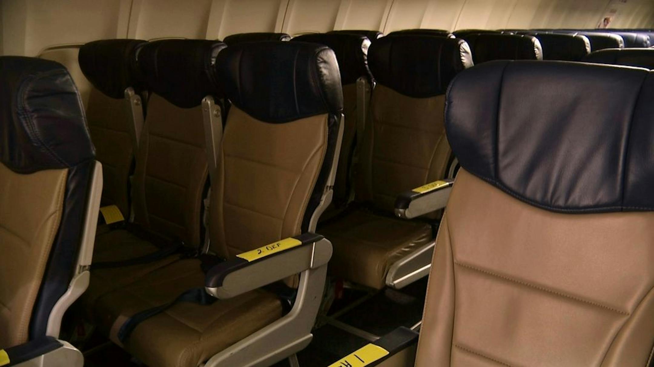 In this Sept. 23, 2013 photo, rows of slimline seats await installation onboard a Southwest Airlines 737 at the carrier's headquarters in Dallas. Southwest says passengers will have the same amount of legroom even though the new seats allow for another row onboard.