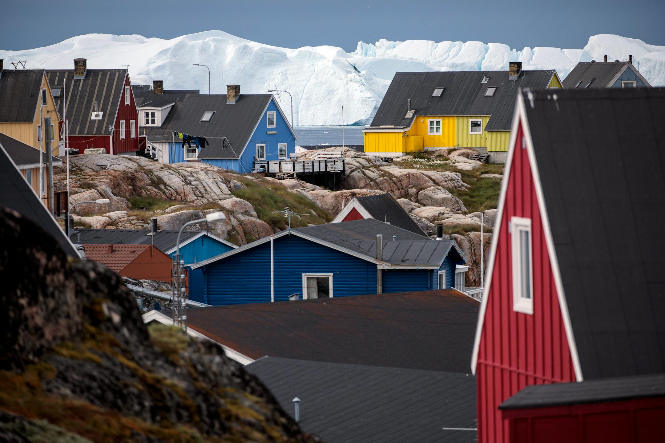 The coastal town of Ilulissat, Greenland, on Aug. 28, 2022. For anyone who has entertained doubts about the warming of the planet, a trip to Greenland serves as a bracing corrective, writes Bret Stephens of the New York Times.