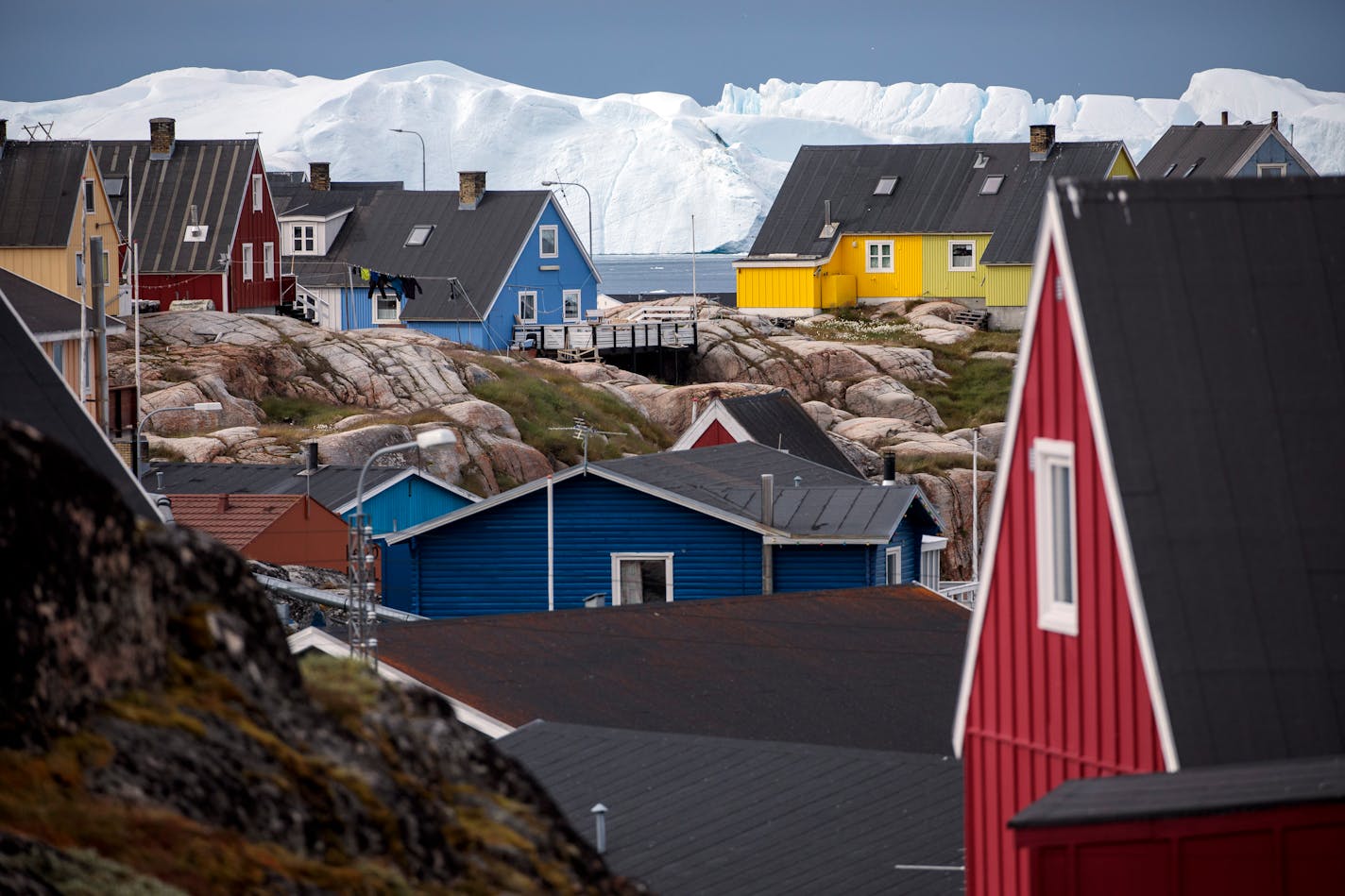 The coastal town of Ilulissat, Greenland, on Aug. 28, 2022. For anyone who has entertained doubts about the warming of the planet, a trip to Greenland serves as a bracing corrective, writes Bret Stephens of the New York Times.