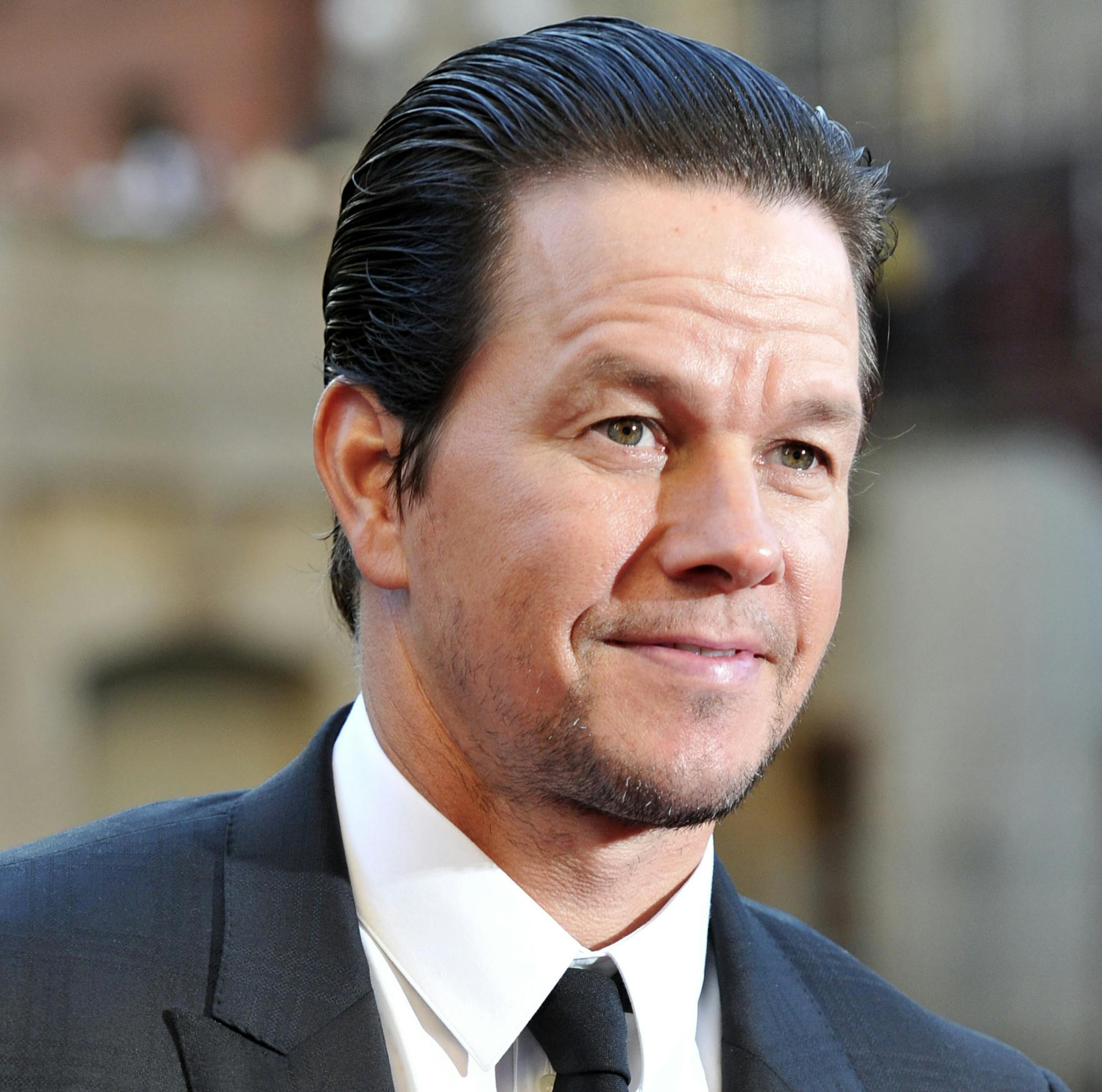 FILE - In this Tuesday, June 20, 2017, file photo, Mark Wahlberg attends the U.S. premiere of "Transformers: The Last Knight" at the Civic Opera House on in Chicago. Wahlberg told the Chicago Tribune on Oct. 20, 2017, that he hopes God will forgive him for his turn as a porn star in the 1997 film ìBoogie Nights.î (Photo by Rob Grabowski/Invision/AP, File)