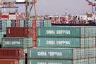 FILE-- Shipping containers, many from China, are seen stacked at the Port of Los Angeles in October 2013. The Trump administration said on Friday, Jun