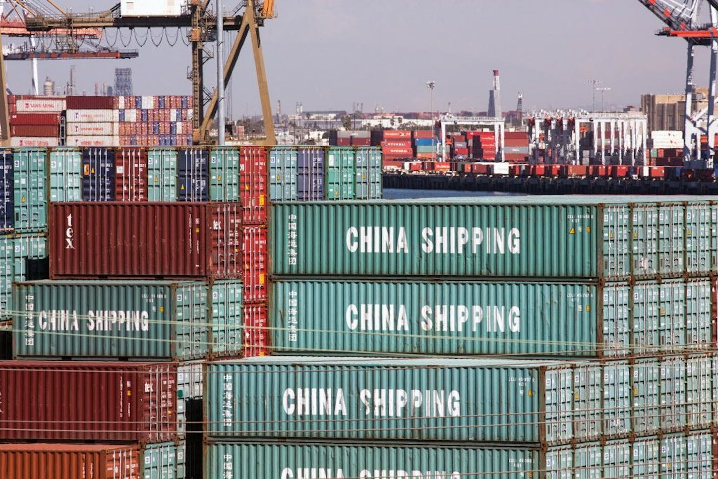 FILE-- Shipping containers, many from China, are seen stacked at the Port of Los Angeles in October 2013. The Trump administration said on Friday, June 15, 2018, that it would move ahead with imposing a 25 percent tariff on $50 billion of Chinese products that are imported into the U.S.