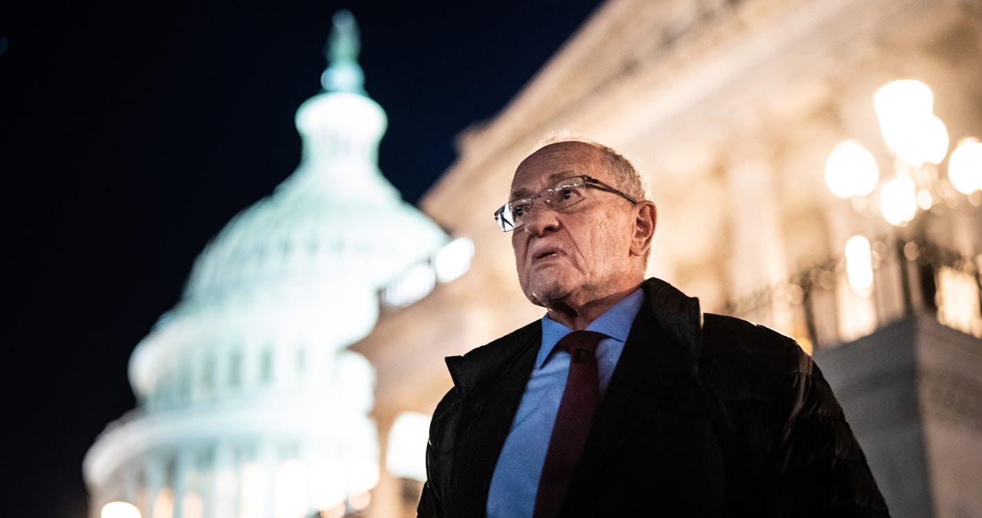 Alan Dershowitz stands outside the Capitol after the day's session of the Senate impeachment trial of President Donald Trump in Washington, late Wednesday evening, Jan. 29, 2020. (Erin Schaff/The New York Times)