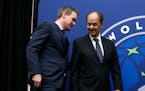 Minnesota Timberwolves CEO Ethan Casson, left, talks with Timberwolves majority owner Glen Taylor following a news conference, Tuesday, May 30, 2017, 