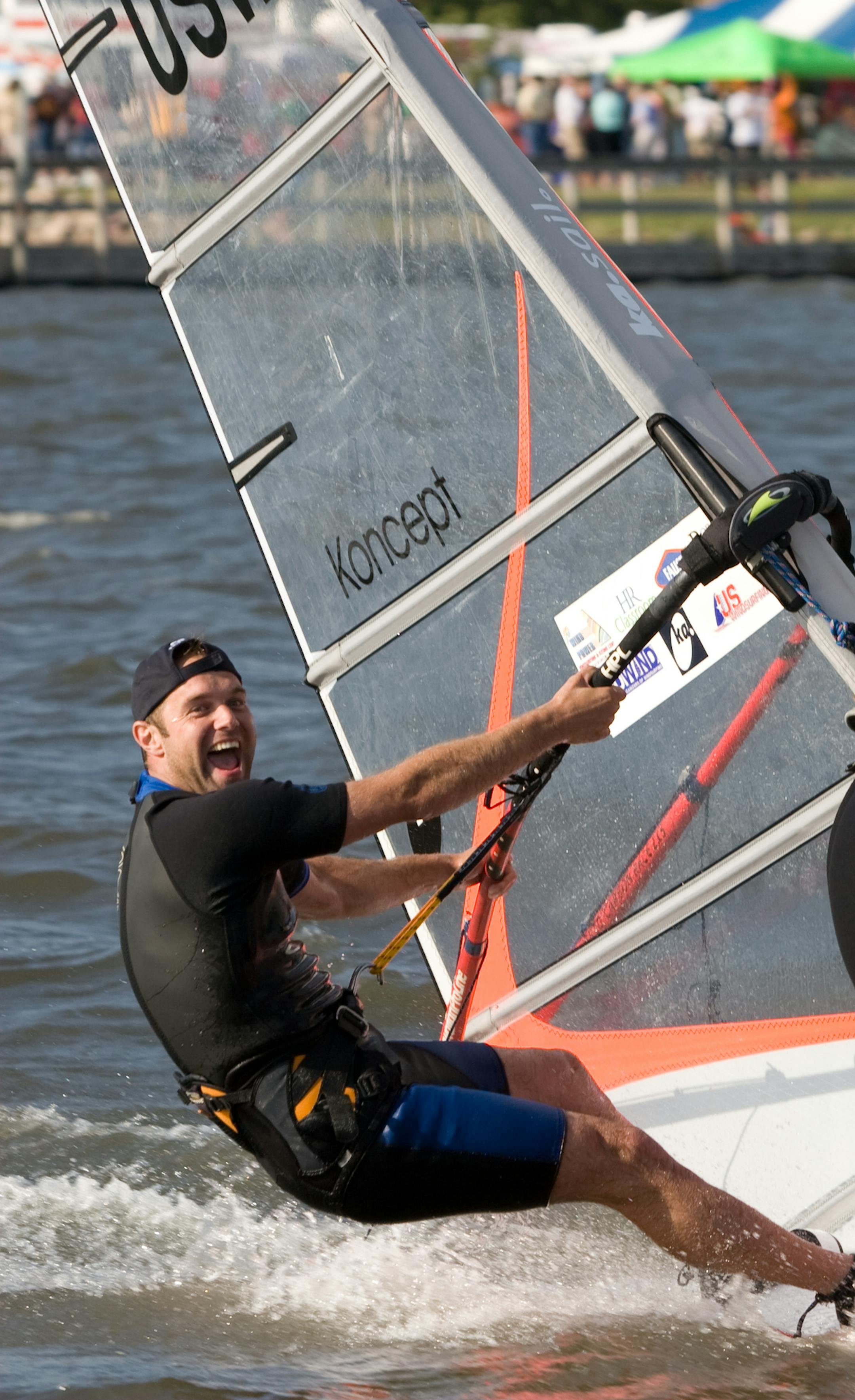 Photo by Dan Norman. Windsurfers on Lake Okabena in Worthington.