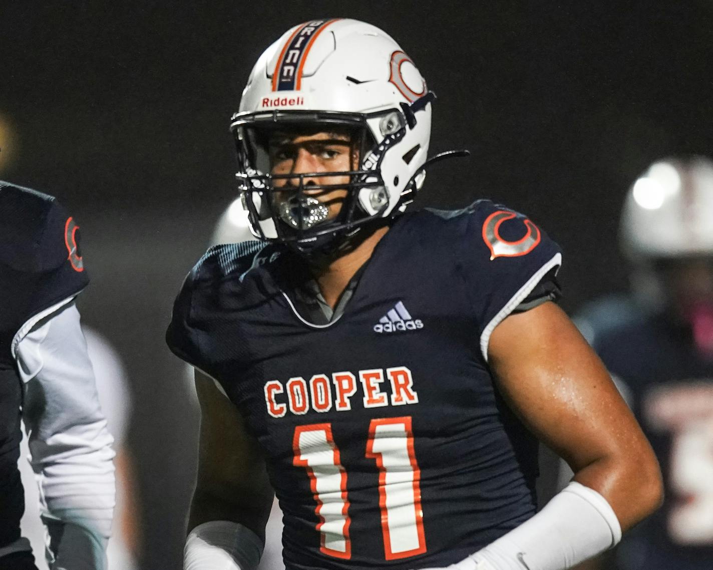 Cooper High School Jaxon Howard (11) ran to the sidelines after blocking a field goal in the fourth quarter.