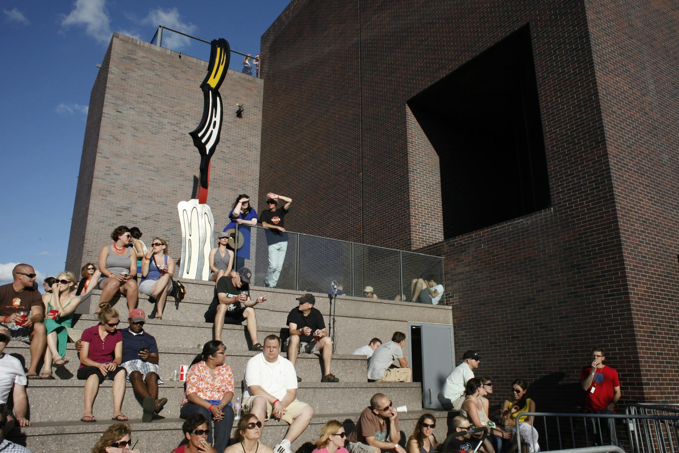 Audience members wait in between acts at the 2012 Rock the Garden concert in Minneapolis, Minn. on Saturday, June 16, 2012.