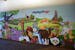 Photos provided (taken by) Dr. Terrell Yeager
The mural features a variety of animals and scenes, including a a fox reading to other animals under a t