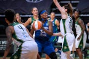 Sylvia Fowles had her path to the rim blocked by Seattle's Breanna Stewart during the first quarter
