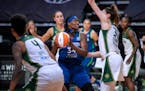 Sylvia Fowles had her path to the rim blocked by Seattle's Breanna Stewart during the first quarter