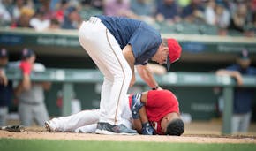 Twins Manager Paul Molitor checked on Eduardo Escobar after he was hit by Red Sox pitcher Rick Porcello during the first inning last week.