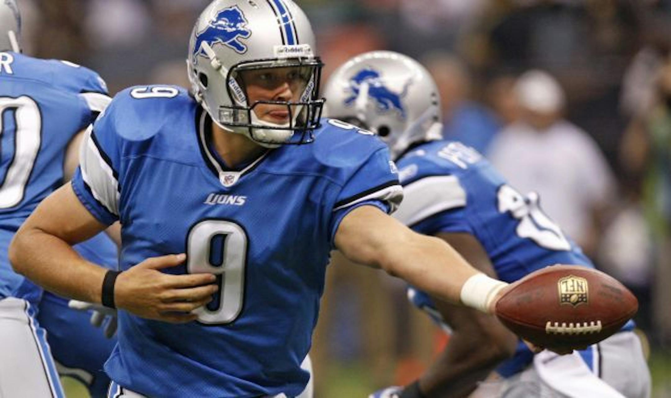 Detroit Lions quarterback Matthew Stafford (9) hands off the football against the New Orleans Saints in an NFL football game in New Orleans, Sunday, Sept. 13, 2009.
