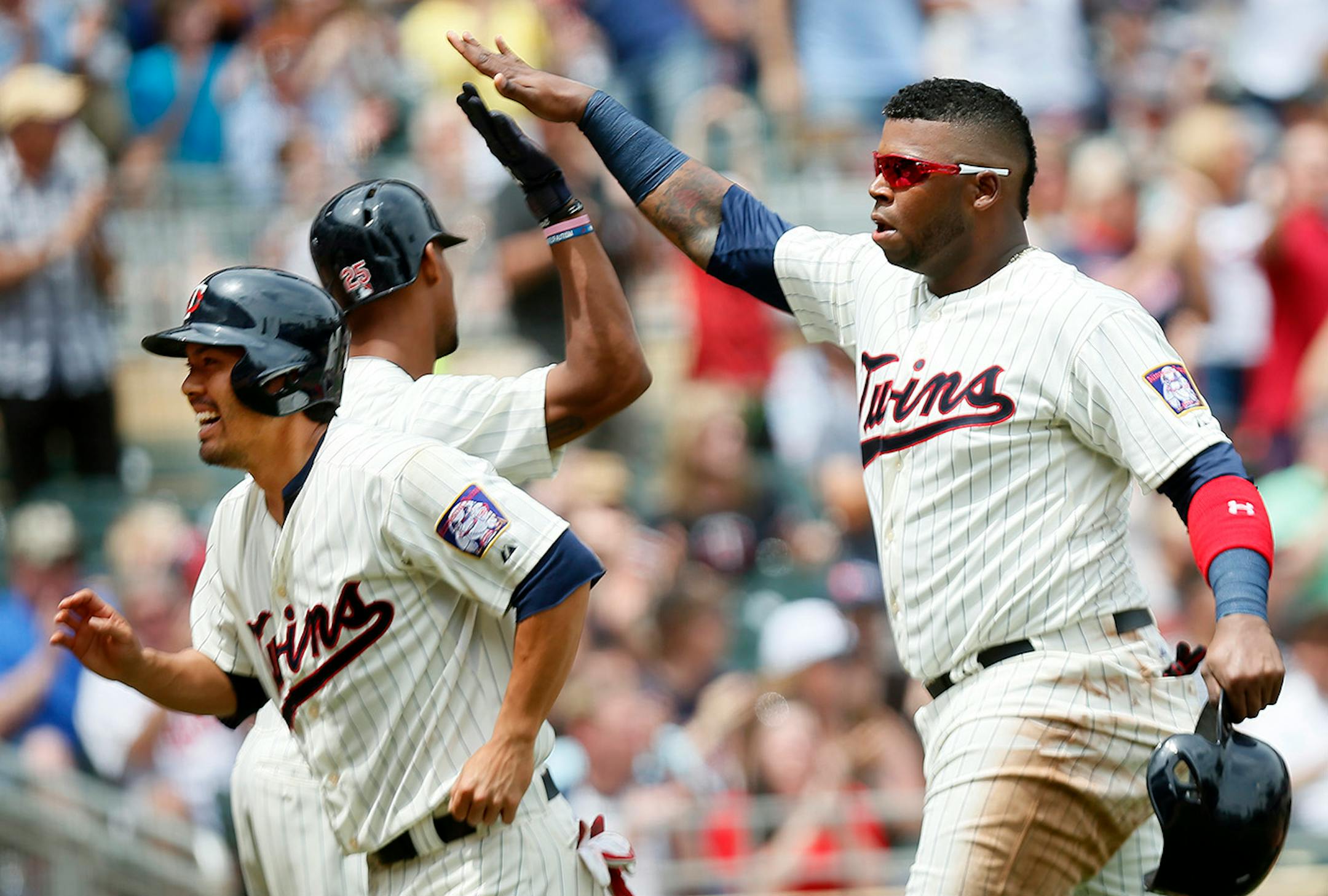 Twins first baseman Kennys Vargas celebrated with Byron Buxton ,and Kurt Suzuki after scoring in the seventh inning at Target Field Wednesday June 24, 2015 in Minneapolis, MN. The Minnesota Twins beat the Chicago White Sox 6-1 at Target Field.