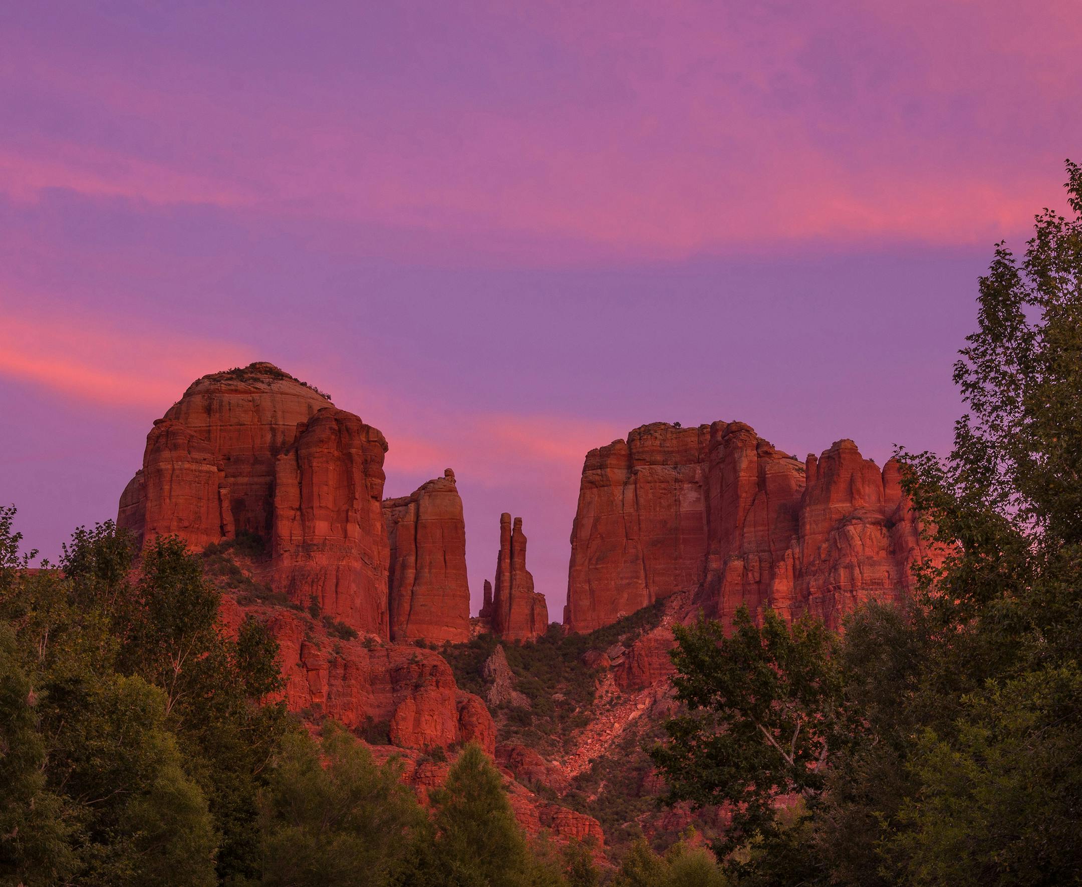 Sunset at Cathedral Rock, Sedona, AZ Can I have your name as you would like it to appear in print, and the town in which you live? Mick Richards, Burnsville Where were you when you took this photo? What does it show? This was taken on the back side of Cathedral Rock, one of the most photographed red rock formations in Sedona.During sunset the red rocks take on a glow and the clouds and green landscape make a nice contrast to the red rocks. What equipment did you use—a phone or a particula