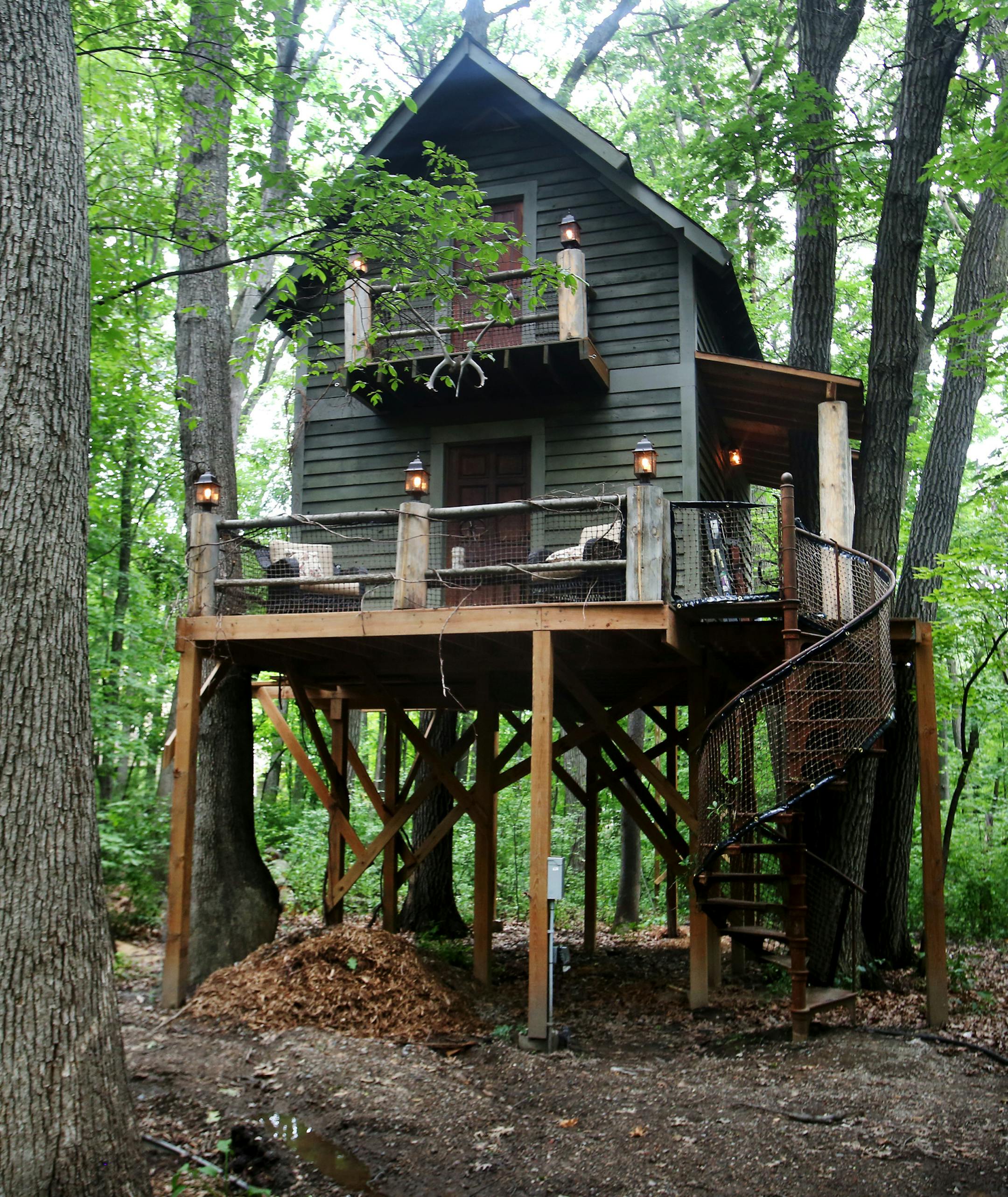 Magician Matt Dunn, whose home sits on 3 acres of wooded land, built a deluxe two-story treehouse that serves as his man cave. describes the exterior as a cabin feel, the interior as magic, cigar lounge feel with a hint of Nye&#x2019;s (as in the longtime, former Northeast Minneapolis piano and polka bar named Nye&#x2019;s Polonaise Room that closed in April 2016).