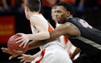 Nathan Heise (4) of Lake City was defended by Javonni Bickham (42) of Minnehaha Academy in the second half. ] CARLOS GONZALEZ &#xef; cgonzalez@startri