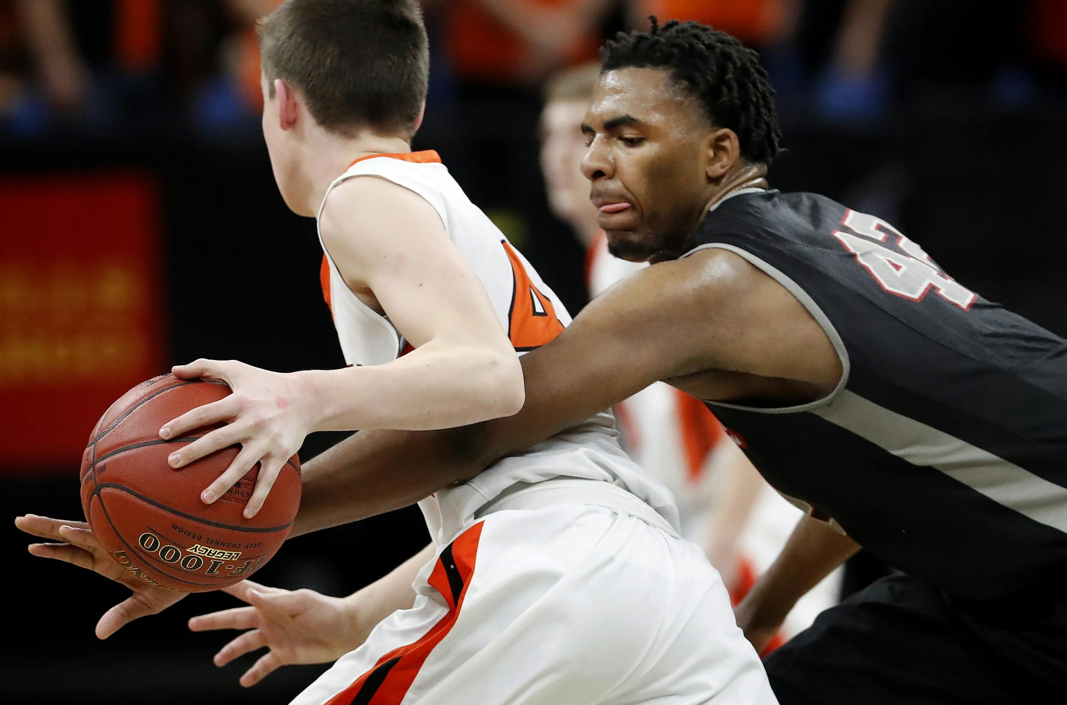 Nathan Heise (4) of Lake City was defended by Javonni Bickham (42) of Minnehaha Academy in the second half. ] CARLOS GONZALEZ ï cgonzalez@startribune.com - March 22, 2017, Minneapolis, MN, Target Center, Minnesota State High School League Boysí Basketball State Tournament, Quarterfinals, Class 2A quarterfinals, Lake City vs. Minnehaha Academy