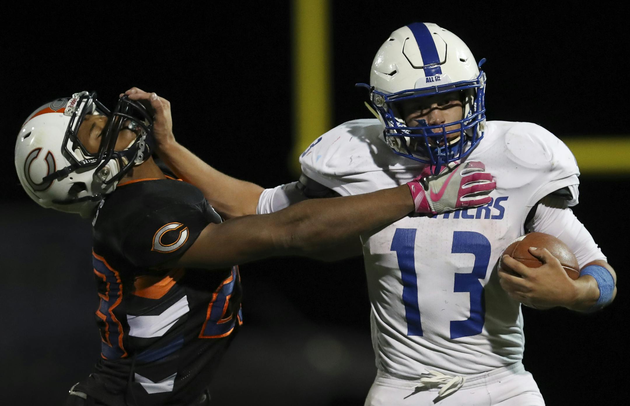 Spring Lake Park's Zachary Ojile set up a second quarter touchdown with a long carry as he held off Cooper's Onte Burns. Ojile finished the game with 262 rushing yards on 20 carries.