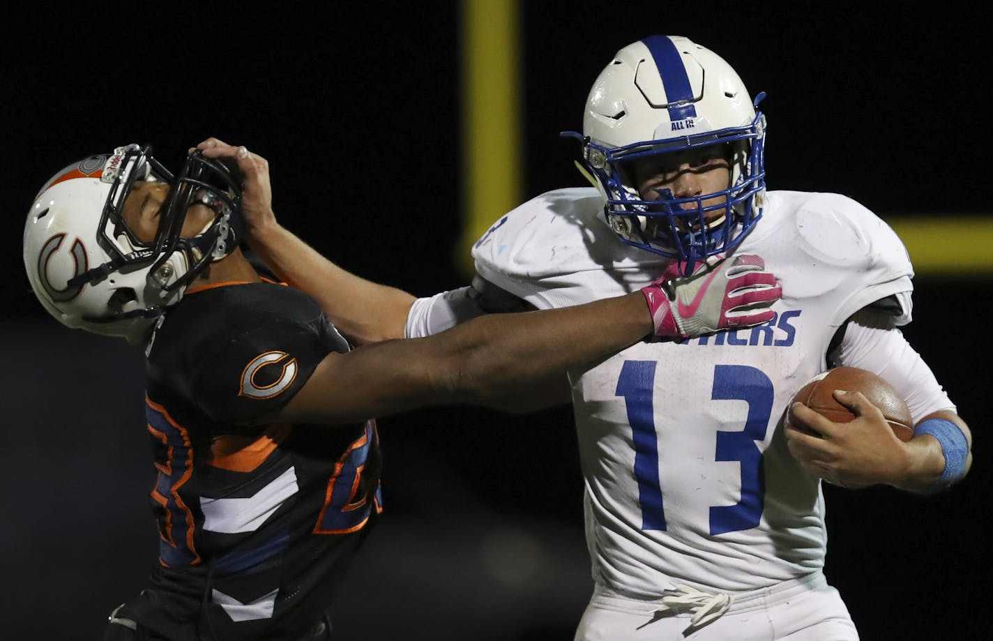 Spring Lake Park's Zachary Ojile set up a second quarter touchdown with a long carry as he held off Cooper's Onte Burns. Ojile finished the game with 262 rushing yards on 20 carries.