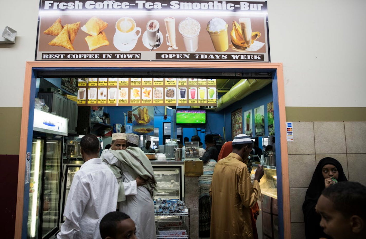 People at the Karmel mall greeted each other and bought coffee and treats after the prayer for Eid al-Fitr, the festival of breaking of the Ramadan fast on July 6, 2016 in Minneapolis.