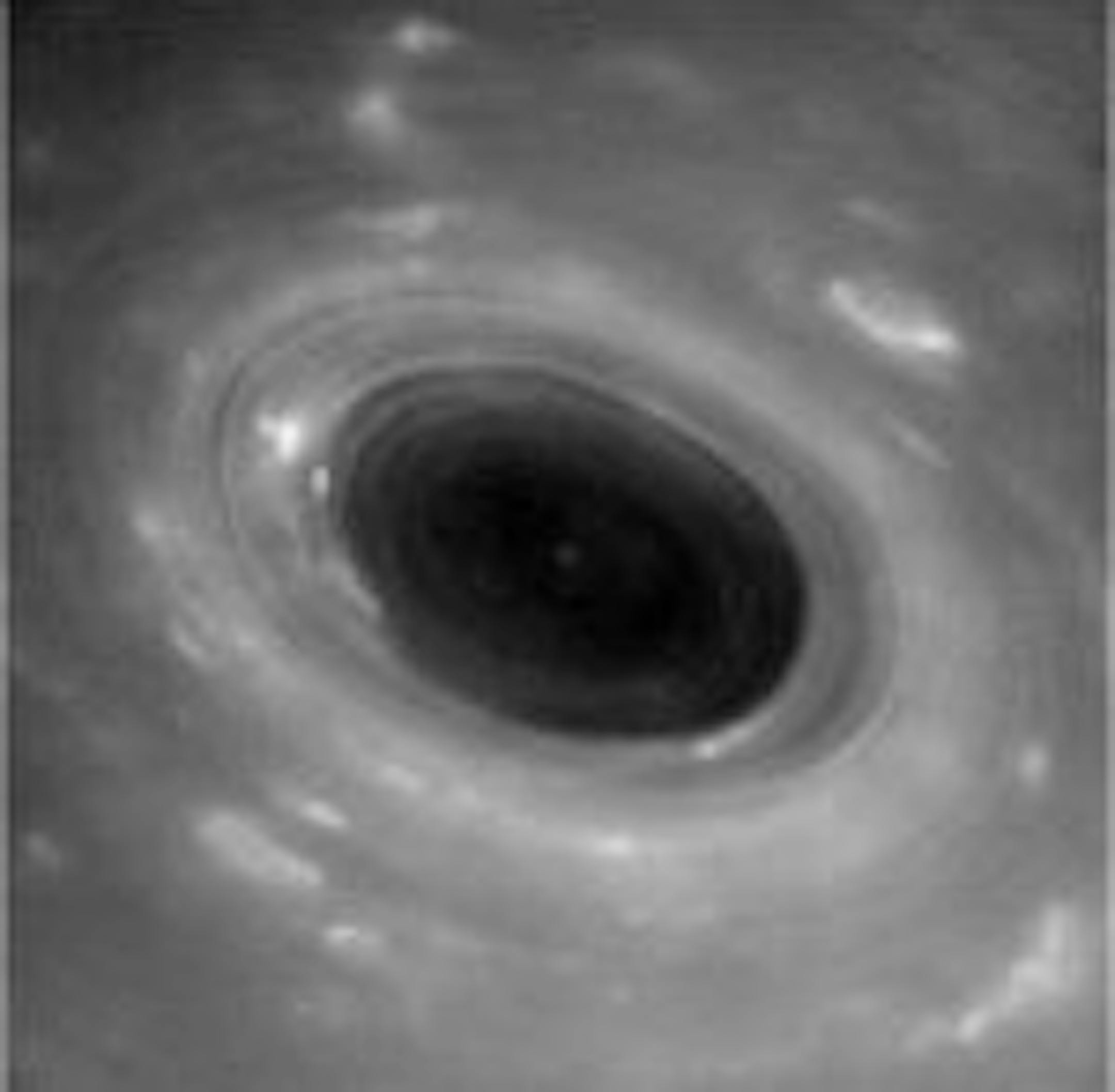 A giant hurricane in Saturn's atmosphere. MUST CREDIT: NASA, JPL-Caltech, Space Science Institute