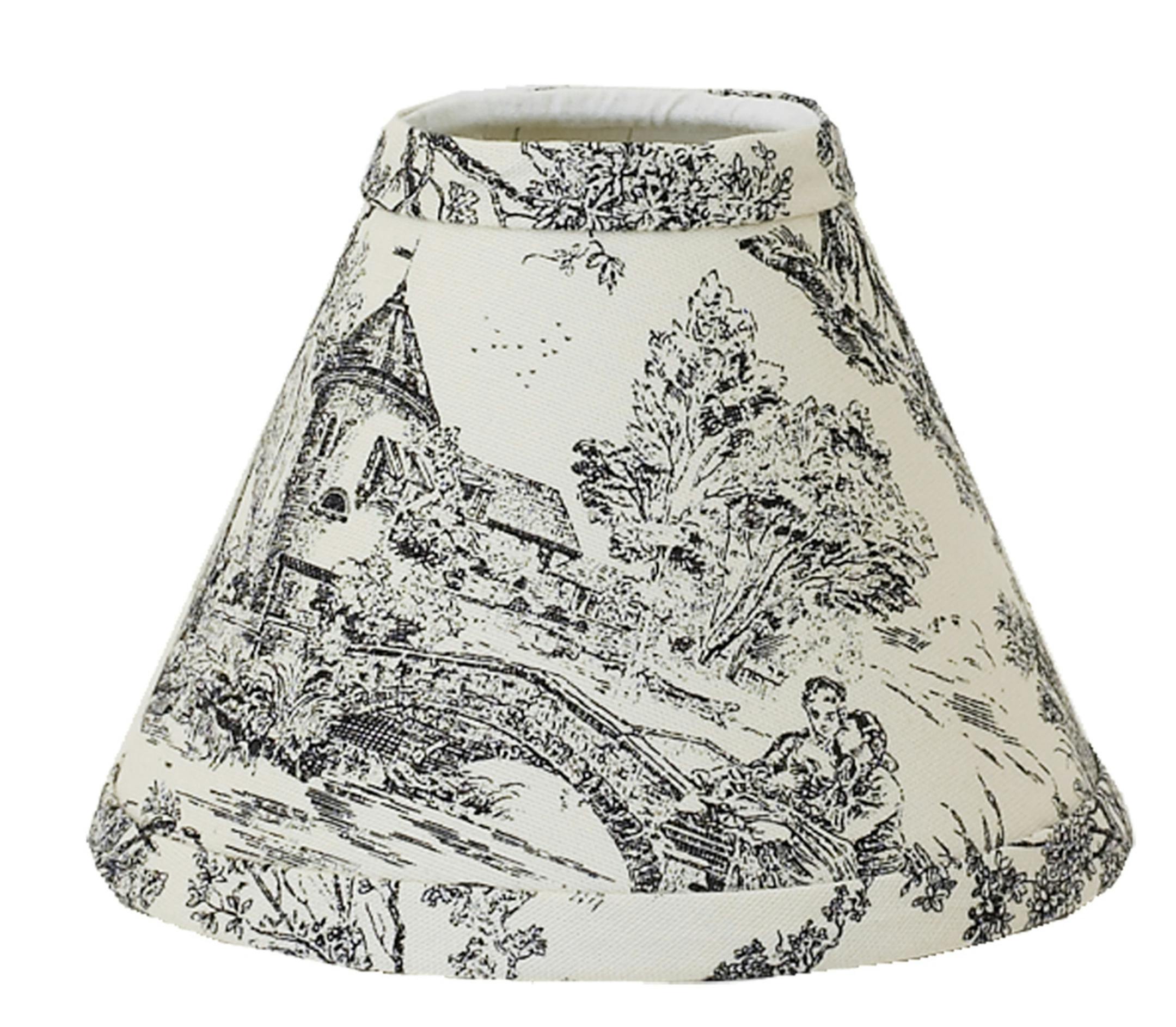 French touch. Black and white toile on a 6 inch chandelier shades also comes in red; $29 from Shades of Light, www.shadesoflight.com (Shades of Light)