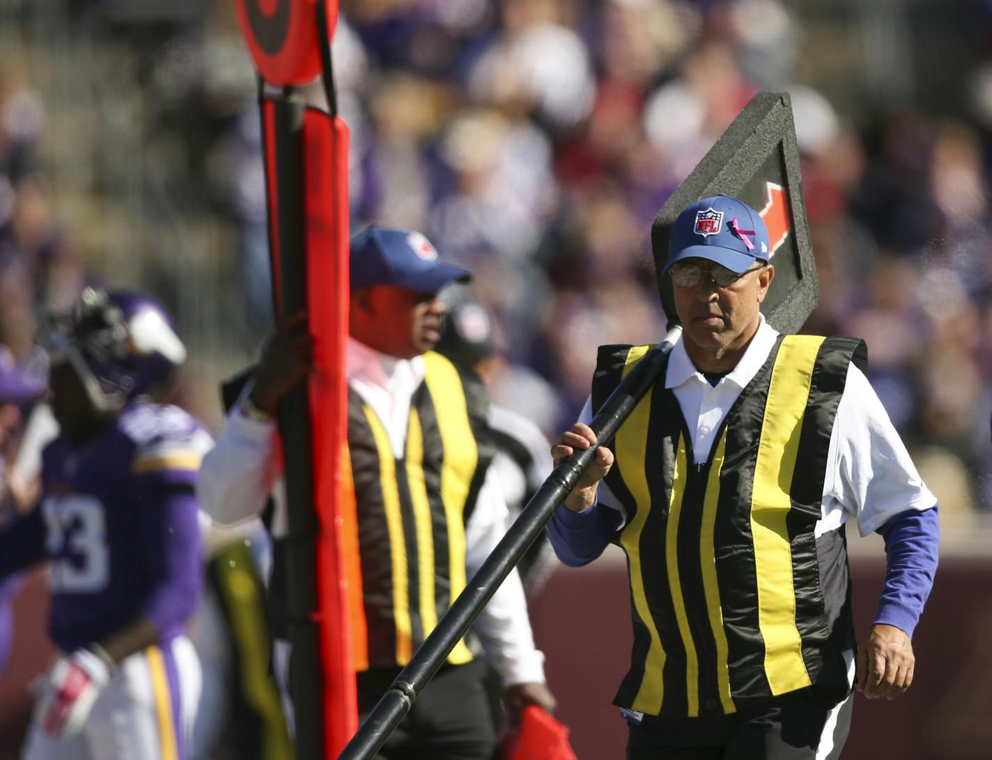 Chain gang member Greg McMoore, center, on the Vikings' sideline in the first quarter Sunday afternoon. ] JEFF WHEELER &#xef; jeff.wheeler@startribune.com The Minnesota Vikings eeked out a 16-10 win over the Kansas City Chiefs in an NFL football game Sunday afternoon, October 18, 2015 at TCF Bank Stadium in Minneapolis.