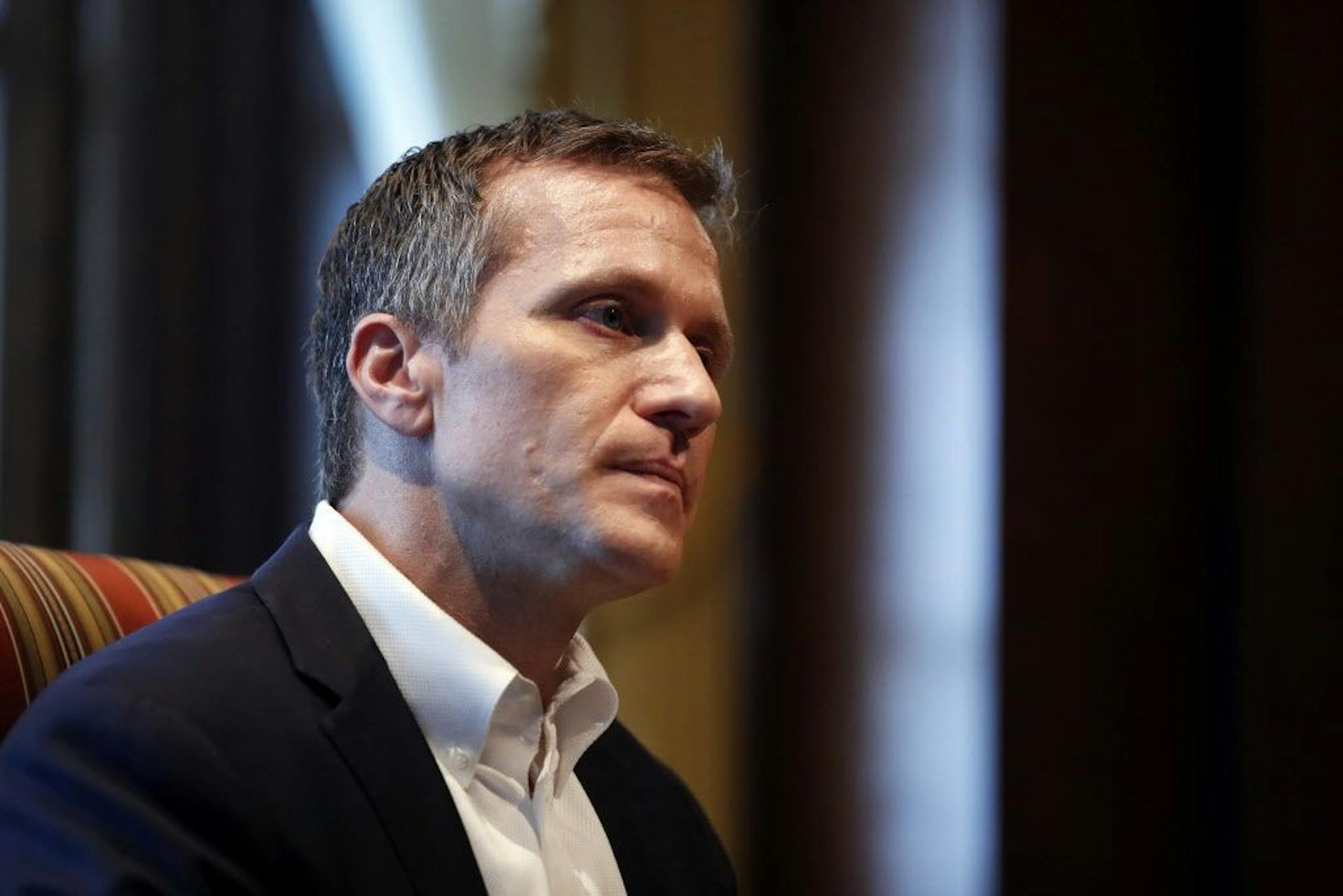 Missouri Gov. Eric Greitens listens to a question during an interview in his office at the Missouri Capitol Saturday, Jan. 20, 2018, in Jefferson City, Mo. Greitens discussed having an extramarital affair in 2015 before taking office.