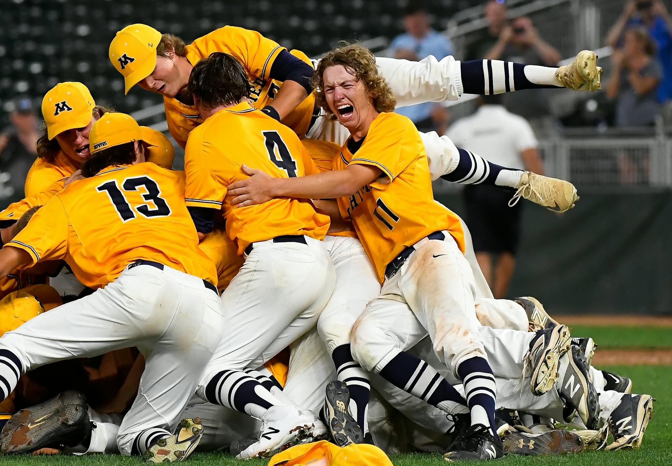 Mahtomedi players, including infielder Shane Brown (11), celebrated their 5-1 victory over Rocori in the 3A championship game Saturday. ] AARON LAVINSKY ï aaron.lavinsky@startribune.com Mahtomedi played Rocori in the Class 3A state baseball championship game on Saturday, June 16, 2018 at Target Field in Minneapolis, Minn.