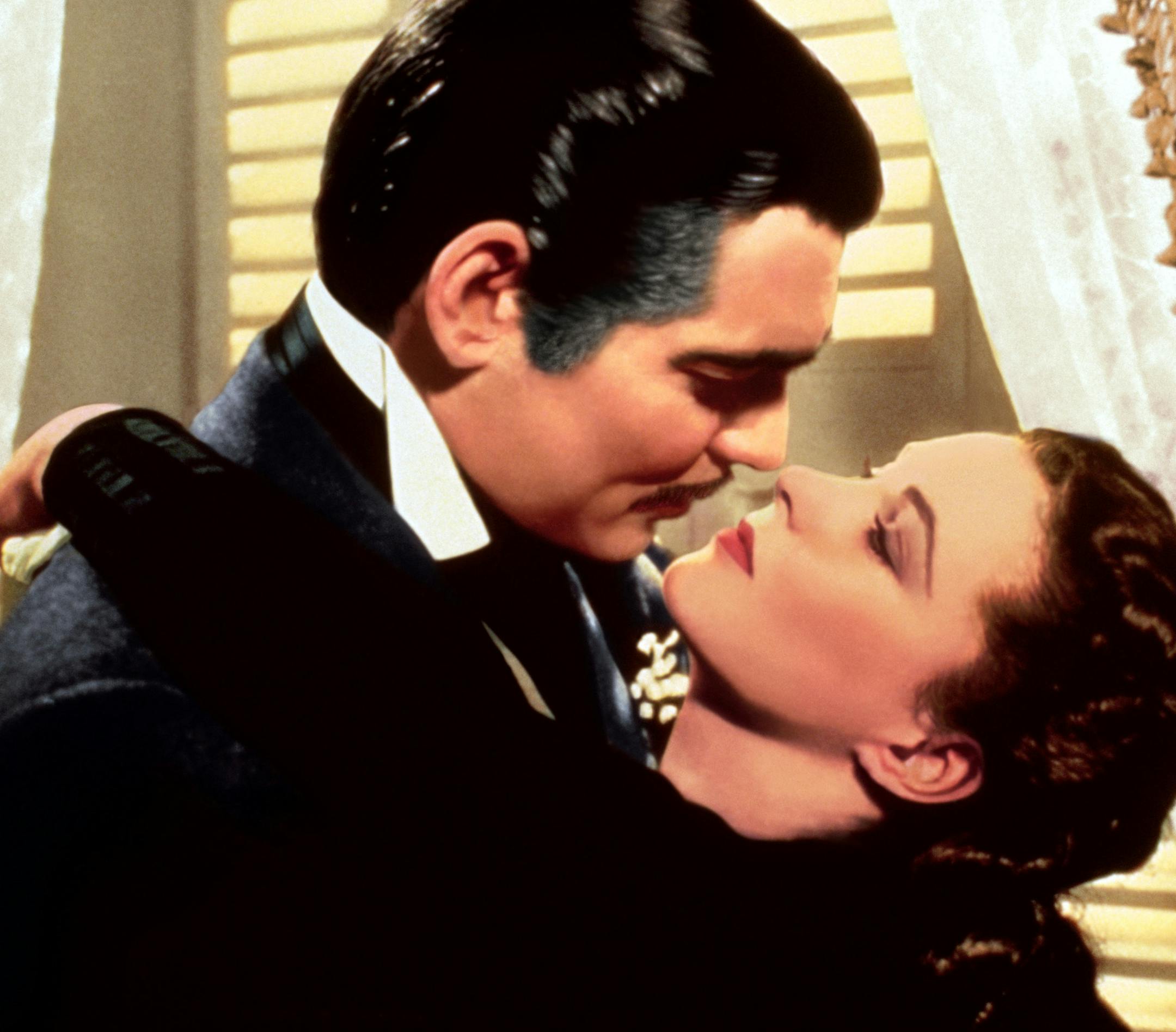 This image released by Turner Classic Movies shows Clark Gable, left, and Vivien Leigh in a scene from "Gone with the Wind." On Thursday, the TCM Classic Film Festival will open its 10th annual edition in Los Angeles with “When Harry Met Sally...” To mark its anniversary, TCM will on Sunday again air “Gone With the Wind,” the film that it first transmitted on April 14, 1994. (Turner Classic Movies via AP)