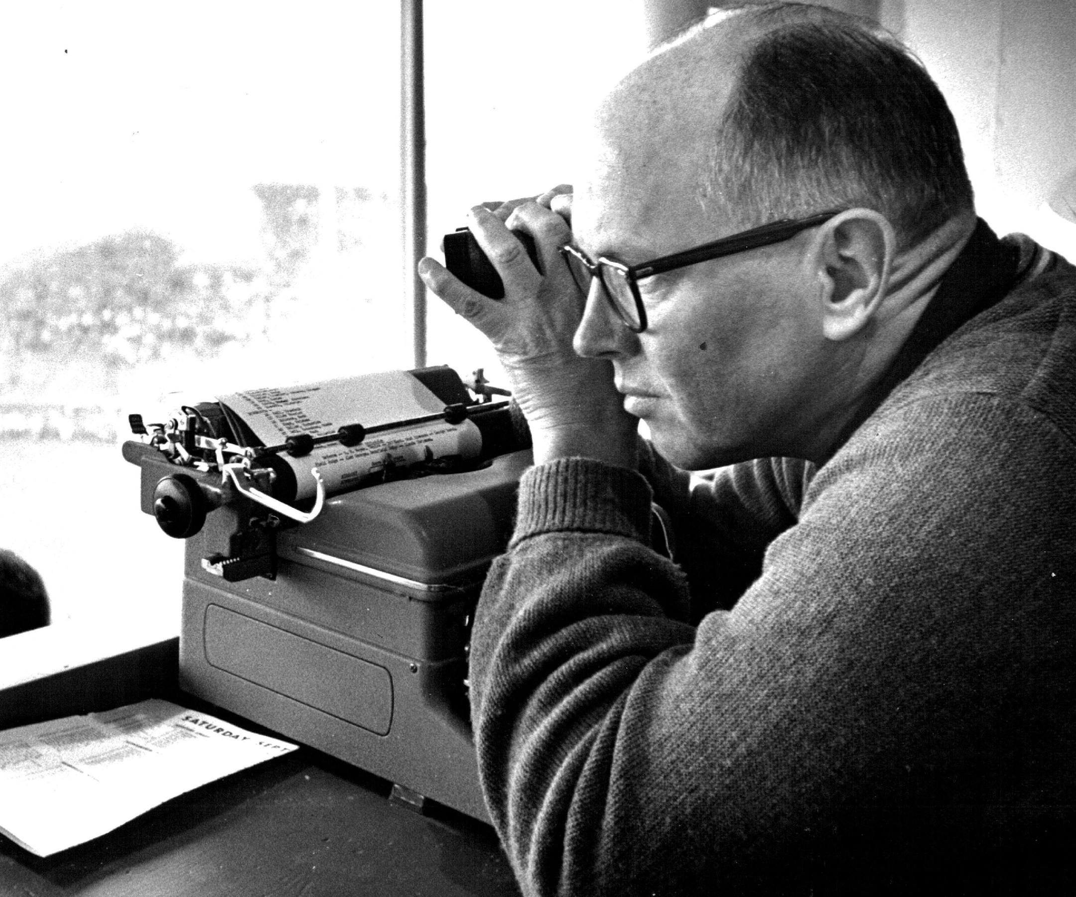 October 8, 1961 Sports information director for the university, Otis J. Dypwick, keeps close tab on the play on the field in order to help furnish statistics and other information to newsmen and radio and TV personnel covering a game. Dypwick also works with Bob Reid, the press-box announcer. Gerald R. Brimacombe