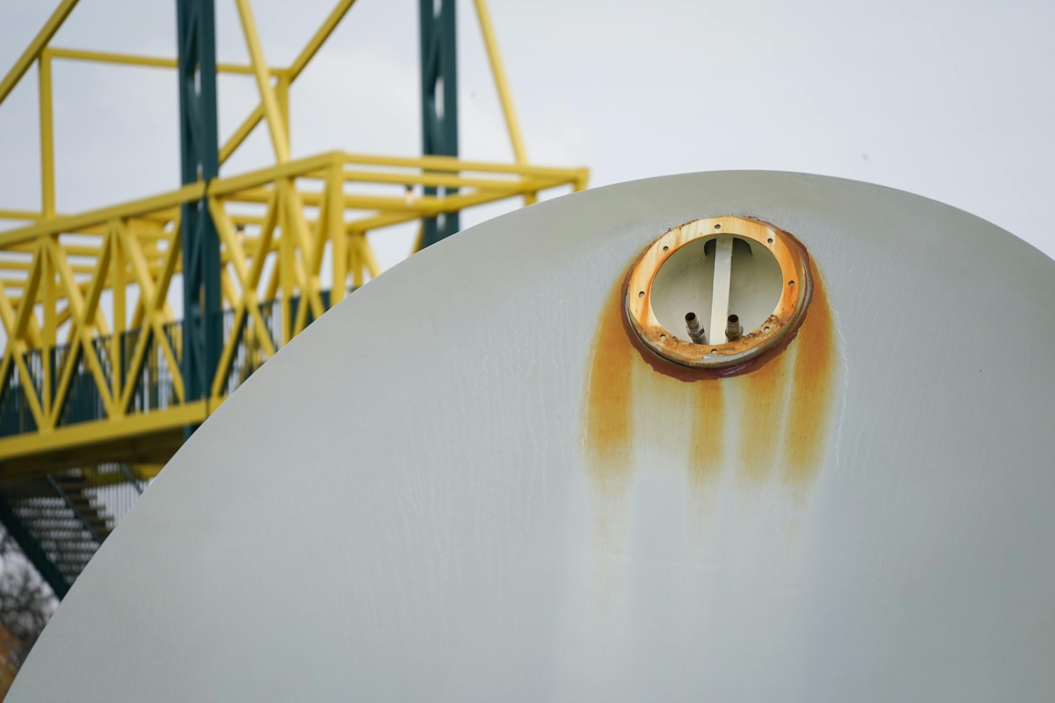The 17500 pound aluminum cherry ball is unbolted, lifted, and separated from the Spoonbridge base it sits atop at the Sculpture Garden in Minneapolis, Minn., on Tuesday, Nov. 16, 2021. Due to the typically harsh conditions of Minnesota winters, this iconic Minneapolis fruit requires a fresh coat of paint about every ten years to keep the cherry's red crisp and glossy. ] SHARI L. GROSS • shari.gross@startribune.com