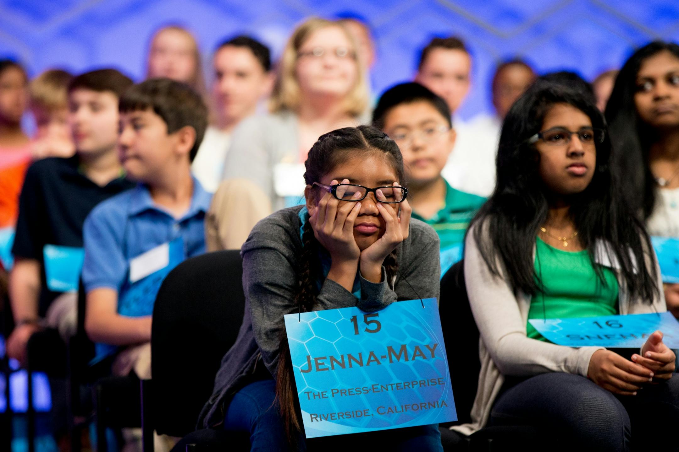 Jenna-May Ingal, 14, of Riverside, Calif. struggles to stay away during the 2015 Scripps National Spelling Bee, Wednesday, May 27, 2015, in Oxon Hill, Md.