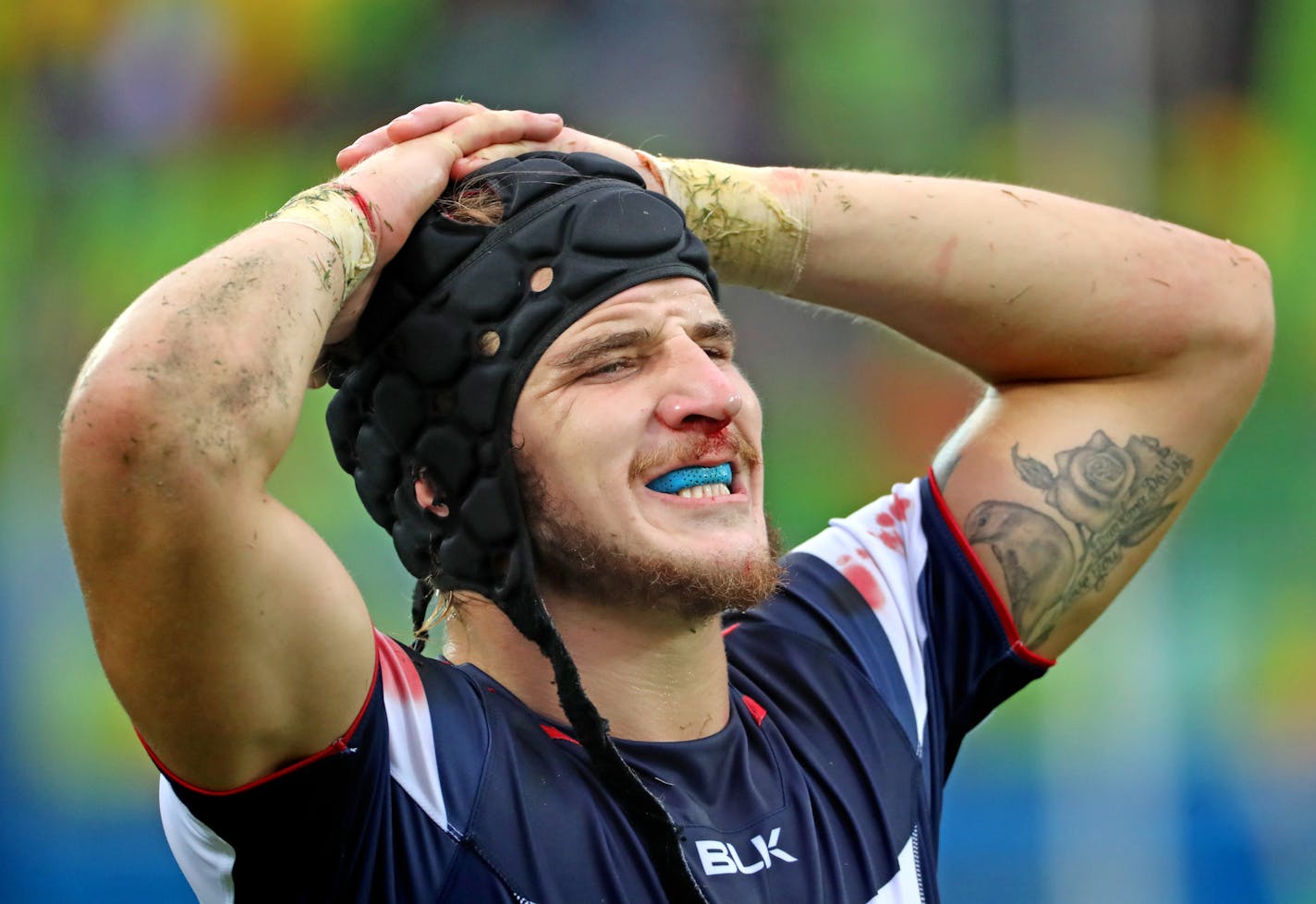 Garrett Bender was bloodied and grass-stained after a 24-19 loss to top-ranked Fiji on Wednesday left the Americans out of medal contention in rugby sevens.