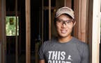 Tommy Dao, a self-made contractor and son of Vietnamese emigrants, stood for a portrait as he and his wife worked on rehabbing a duplex Thursday. ] AN