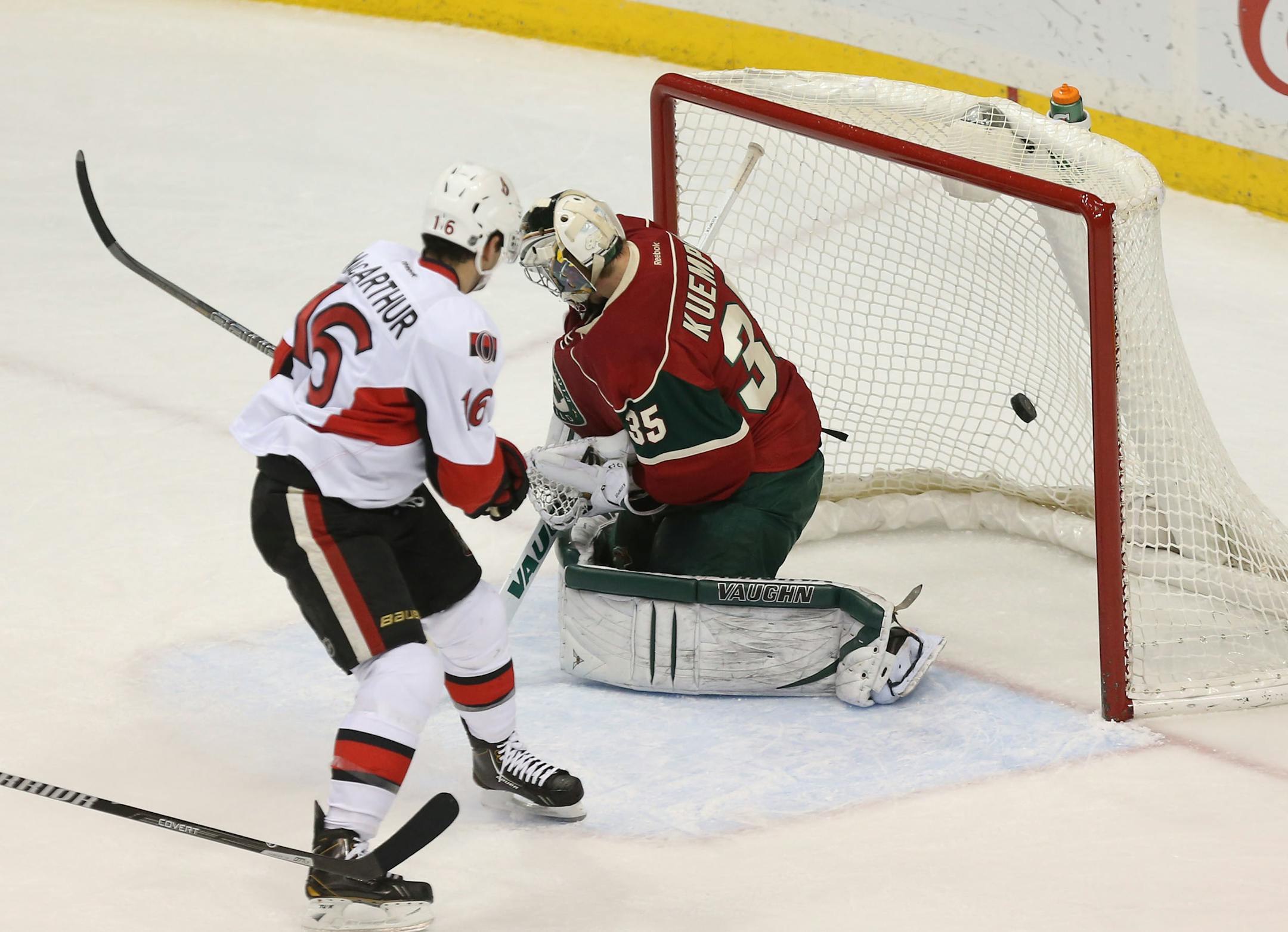 Ottawa's Clarke MacArthur shot the puck passed the Wild's goalie Darcy Kuemper to score during the first period January 14, 2014.