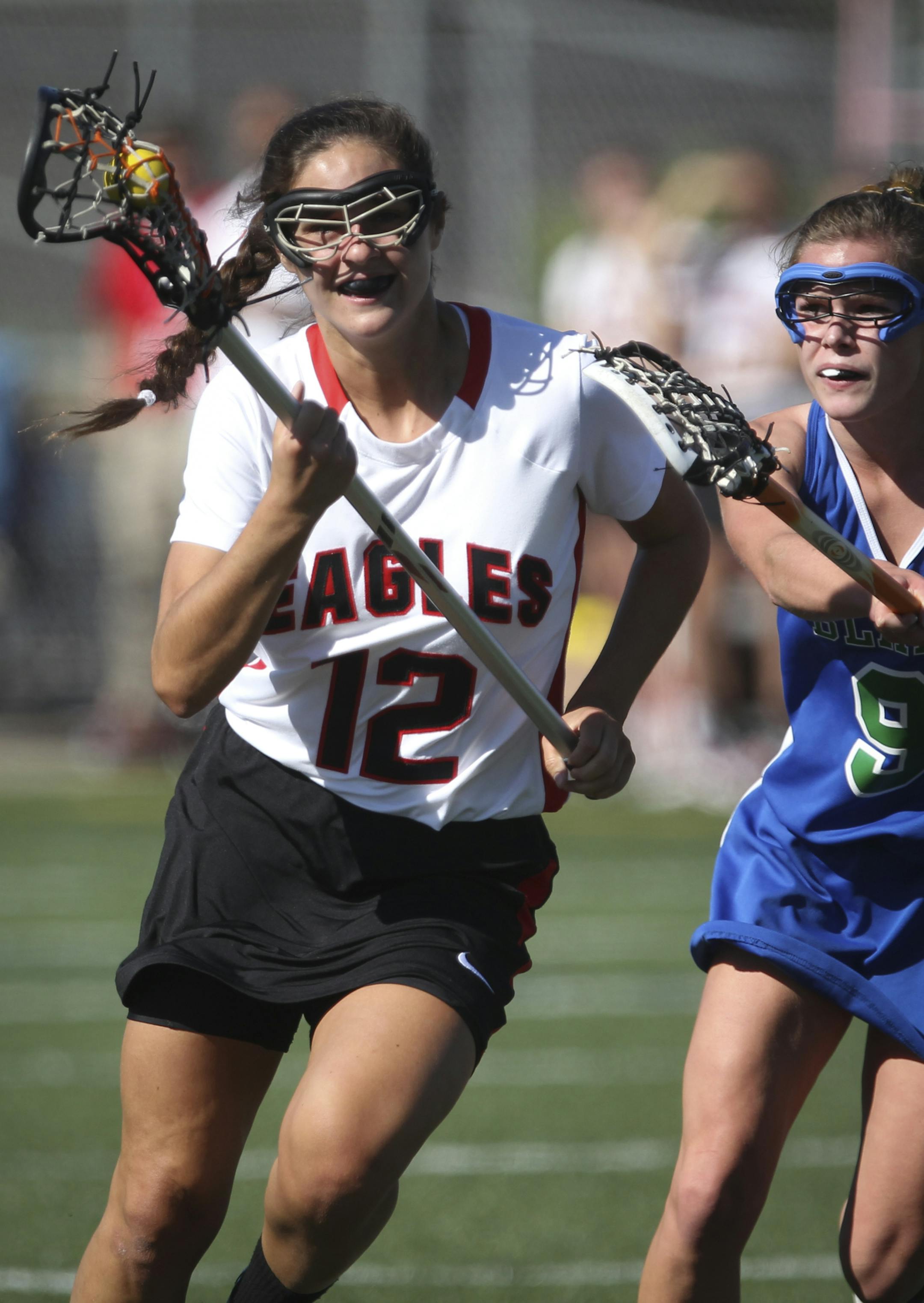 Emma Claire Fontenot carried the ball during a girls lacrosse game between Eden Prairie and The Blake School at Eden Prairie High School in Eden Prairie, Minn., on Thursday, May 23, 2013. ] (RENEE JONES SCHNEIDER * reneejones@startribune.com)