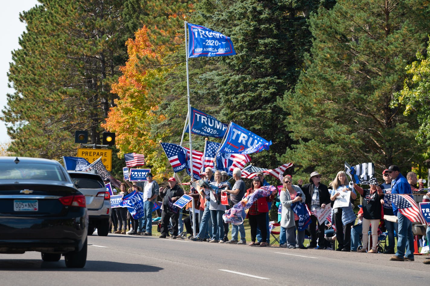 Trump supporters and Biden supporters lined opposite sides of Hwy. 53 in Hermantown, Minn.