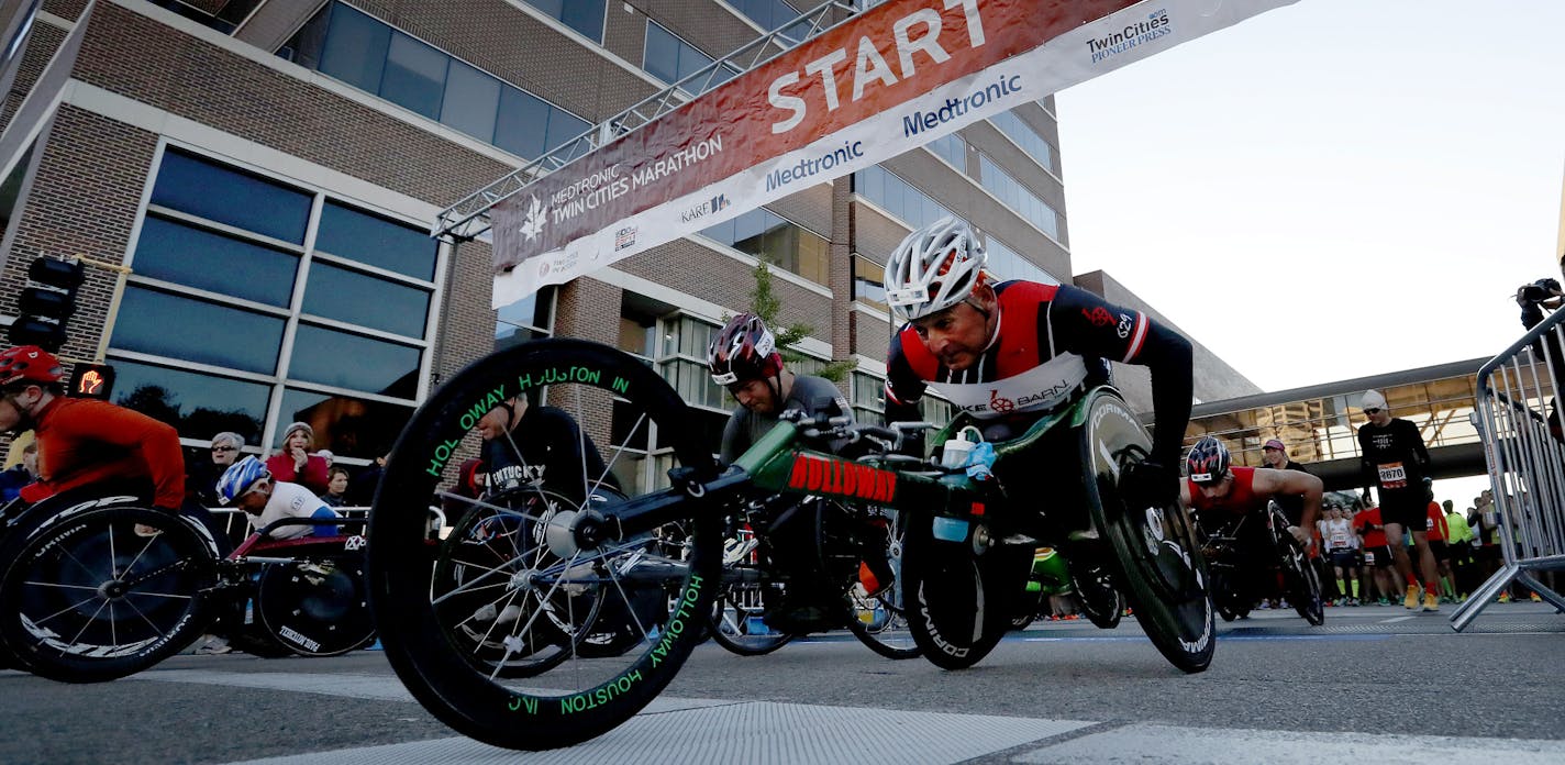 Wheelers left the starting line of the Twin Cities Marathon in Minneapolis. ] CARLOS GONZALEZ cgonzalez@startribune.com - October 9, 2016, Minneapolis, St. Paul, MN, Twin Cities Marathon